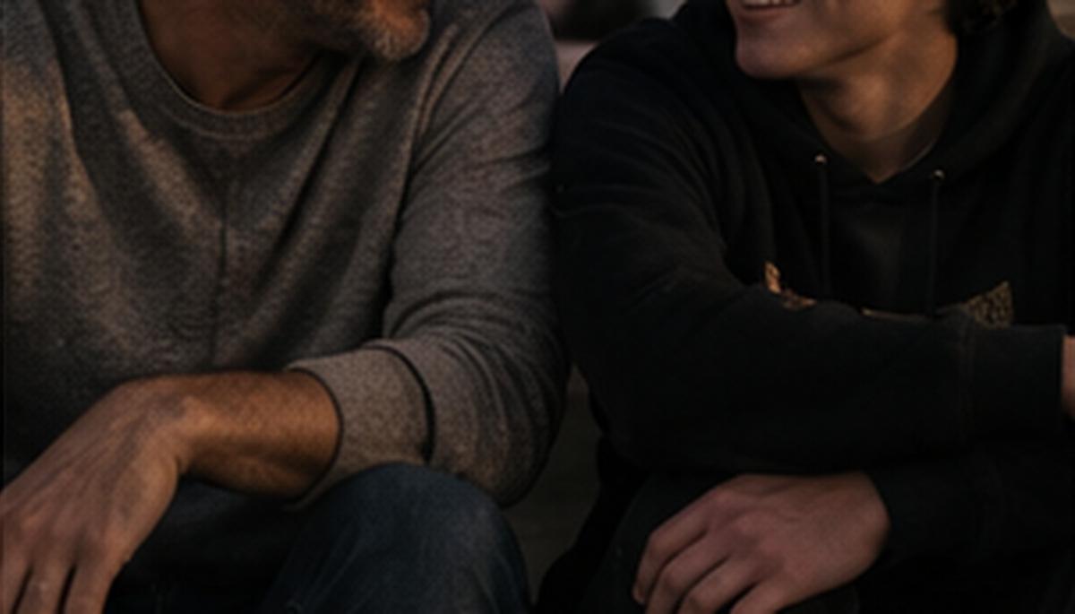 A parent and teen sitting together